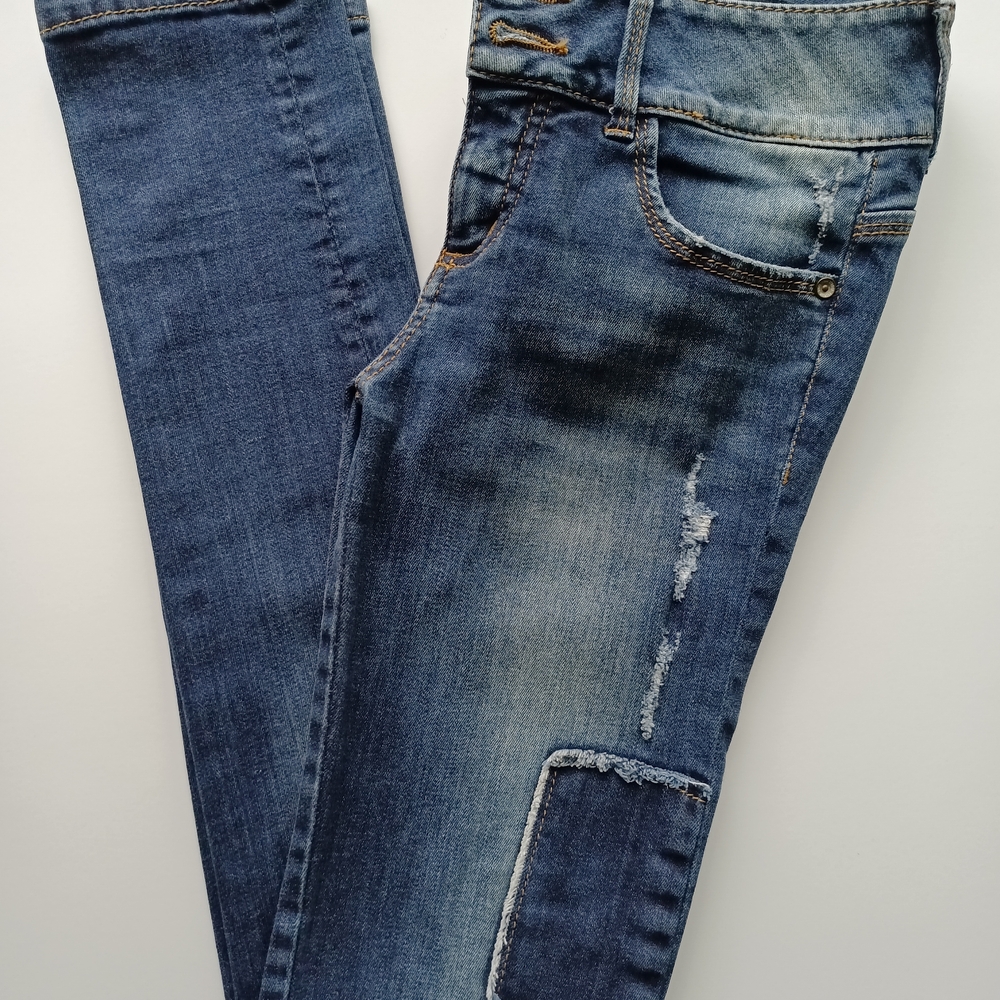Blue Skinny Jeans with Distressed Details